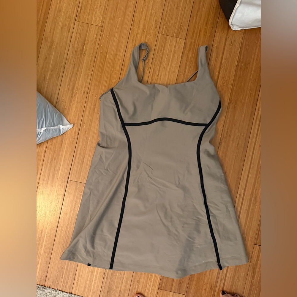 Stylish tan athletic Dress with Black Accents
